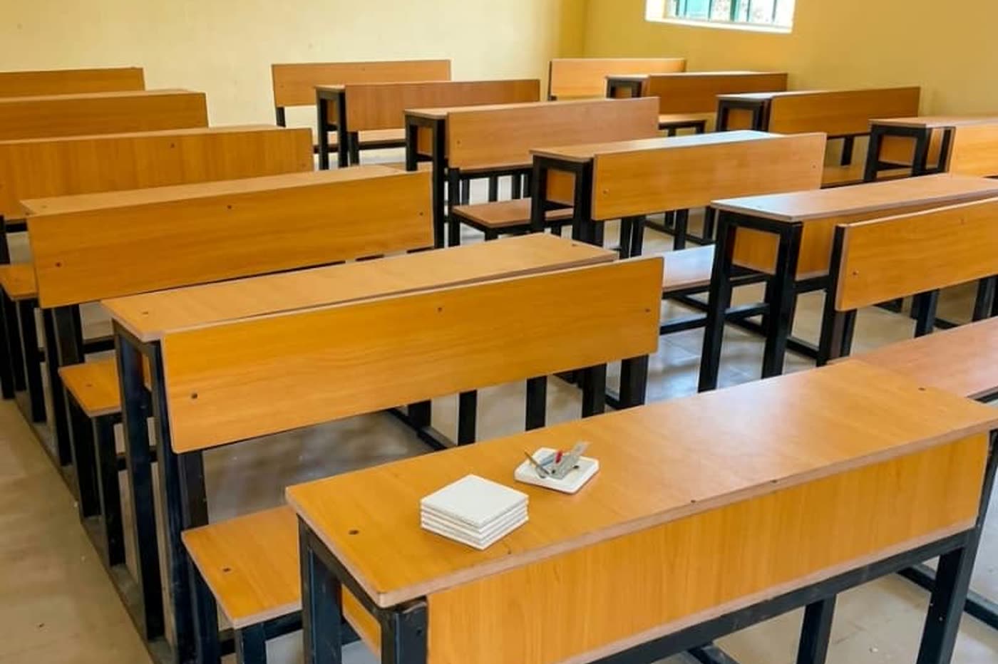 New desks and benches in a finished classroom